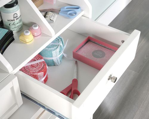 29287TK | The Teknik Office Craft Organiser Hutch in a White Finish is a delightfully simple and useful optional extra for our Craft Ranges 5421405 Craft Open Storage Cabinet, 5421407 Craft Storage Cabinet or the 5421417 Craft Desk/Table. It has open cubbyhole storage to provide easy access of your craft items as well as two storage drawers with full extension slides which can hold additional supplies. It also benefits from an enclosed back with cord access to allow a convenient path for all of your cables. 