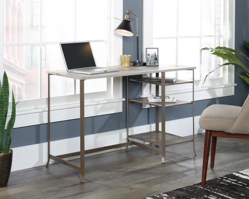 Teknik Office City Centre Desk in Champagne Oak Finish with contrasting durable satin taupe metal frame and changeable left or right shelving.