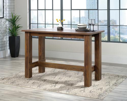 The Teknik Office Counter Height Work Bench in Grand Walnut effect is a charming and delightfully neutral coloured option for all styles of office, although compact in size, it provides more than ample space for writing and computer work. It benefits from a large desktop working surface, a one inch thick split top which allows a convenient path for cables. This has a multi-purpose design which means that once open, it can accommodate up to four people. This work bench also benefits from a 360 degree finish, with the option to be freestanding. This is also available in Vintage Oak and Chalked Chestnut.