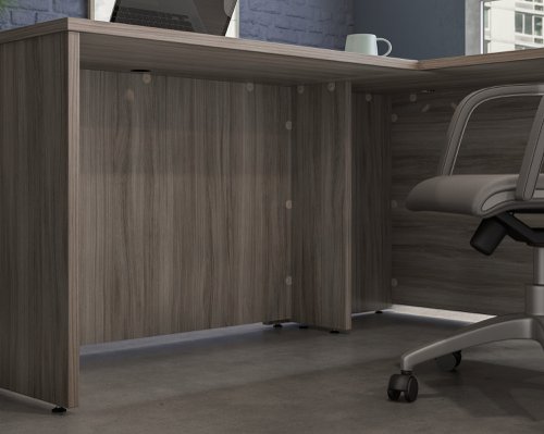 The Teknik Office Affiliate Return Unit is our functional and commercial style option for all manner of colour schemes and work spaces.  This return desk offers a very durable 1” thick melamine heat, stain and scratch resistant top to hold up your laptop, favourite beverage and display items with ease. It comes with a handy grommet hole for easy cord management and the adjustable base feet will ensure it stays perfectly level on even the most uneven floors.  Beautifully finished in a Hudson Elm effect, this Return Unit also benefits from a 360 degree finish for adaptable placement within your office. Please be aware, this is an add-on return unit for extending current Affiliate desking codes: 5427427, 5427422 and 5427468, this can be conveniently placed as either a left or right hand return unit.  There are also other matching cupboards, desks, hutches and bookcases within the Affiliate range which will complement this item.