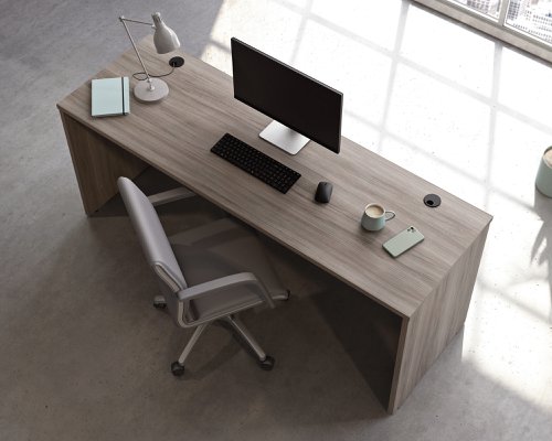 25808TK | The Teknik Office Affiliate 1800 x 600 Desk is our functional and commercial style option for all manner of colour schemes and work spaces.  This large desk offers a very durable 1” thick melamine heat, stain and scratch resistant top to hold up your laptop, favourite beverage and display items with ease. It comes with two handy grommet holes for easy cord management and the adjustable base feet will ensure it stays perfectly level on even the most uneven floors.  Beautifully finished in a Hudson Elm effect, this Desk also benefits from a 360 degree finish for adaptable placement within your office. It can be used as a stand alone desk or can be fastened to the left or right side of these Affiliate desking codes: to 5427413, 5427427 and 5427468  to extend your work area. There are also other matching cupboards, desks, hutches and bookcases within the Affiliate range which will complement this item.