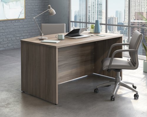 Teknik Office Affiliate 1500870 Bow Front Desk in a Hudson Elm effect finish two grommet holes for cord management
