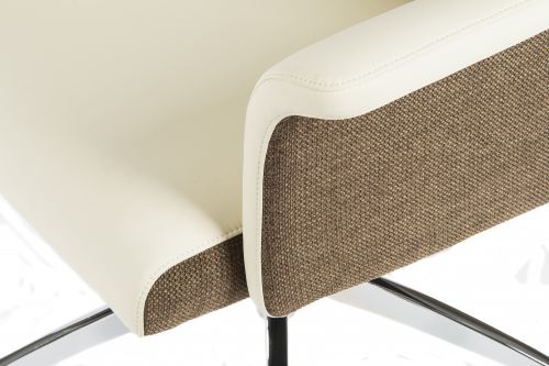 The Teknik Office Elegance High Executive Chair in Cream is our wing armed supple leather look upholstery offering for those that wish for a unique managerial chair thats as comfortable as it is stylish. It benefits from a pleasing contrast of Cream leather look, a chocolate cross-woven accent fabric and has a 'Mid century' styling. The swivel base is made from chrome to add to its smart appearance and it has all the usual executive chair functions such as reclining function with tilt tension and a height adjustable seat. This chair is great for home or work office use for up to 8 hours a day and is rated to 150kg. This chair is also available in Black with chocolate accenting as well as the same in a medium backed version.