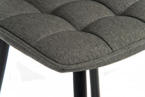Teknik Office Quilt Barstool with padded grey fabric upholstery and black powder coated metal legs