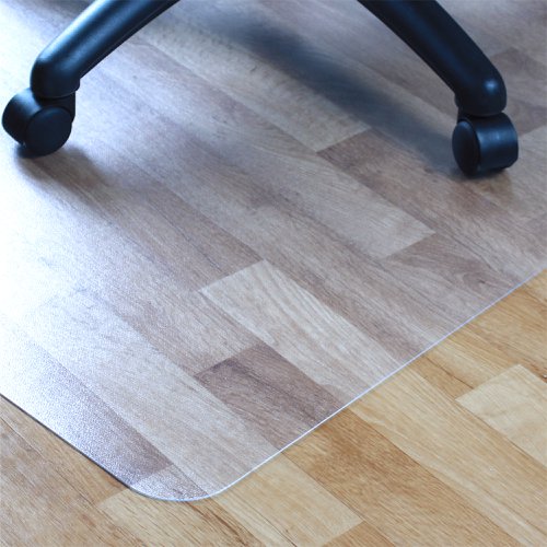 The Teknik Office PVC Chair Mat for Hard Floors is a durable and protective barrier designed to prevent damage caused by chairs with castors within your hard floor work area, preserving its life and preventing additional wear. Measuring 90 x 120, this smooth-backed mat provides a rigid and flat platform that minimizes the impact when moving the chair, ergonomically designed for reducing stress and strain on the legs, spine, and lower back. The lightly embossed top surface of the mat provides the perfect amount of grip to assist in aligning chair castors, making it easier to move around the workspace. This chair mat is 100% free of harmful DIDP Phthalate content, which is better for air quality compared to conventional PVC products. It is also 100% recyclable, making it an eco-friendly choice for homes and businesses that want to reduce their environmental impact. The mat is manufactured in the UK, and 50% of the manufacturing site's energy is derived from renewable sources. This ensures that the product is produced sustainably and reduces the carbon footprint associated with its production. Additionally, the mat comes with a limited lifetime warranty, providing peace of mind for buyers who want to invest in a durable and long-lasting product.