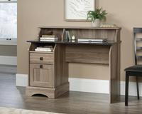 Teknik Office Farmhouse Desk with Salt Oak Finish and Rosso Slate accents two storage drawers and cubbyhole storage