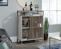 Teknik Office City Centre Cabinet with Sliding Door in Champagne Oak Finish with contrasting durable satin taupe metal feet two adjustable shelves and