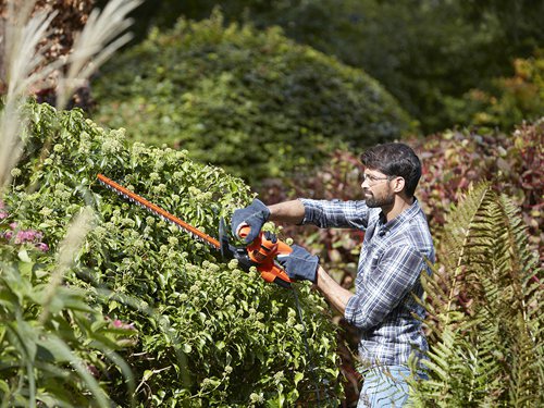 The Black & Decker BEHT201 Hedge Trimmer is ideal for small to medium hedges, with a max cutting capacity of 16mm. This model is 10% lighter than previous models, making it compact and ergonomic for less fatigue during long trimming tasks. It is fitted with a translucent blade guard for greater visibility when working above head height. There is also a secondary handle for greater control and comfort.SpecificationInput Power: 420WStrokes at No Load: 1,960/min.Blade Length: 45cm, 16mm gapBlade Brake: 