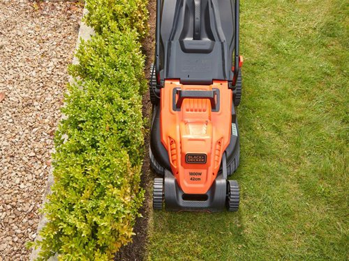 The BLACK + DECKER BEMW481BH Mower has been engineered for greater comfort and maneuverability. An easy start function allows users to switch the mower on and off effortlessly, using activation button. Ideal for lawns up to 600m², equivalent to 3+ tennis courts.Its high performance blade provides 80% better grass collection and greatly improved cutting results. A large collection box enables you to power through the mowing without the frustration of continuously emptying the container. A ‘Box Full’ indicator alerts you when it’s time to empty. A simple lever allows you to adjust the cutting height with ease. Specifications:Input Power: 1,800W.Cutting Width: 42cm.Cutting Height Adjustment: 20-70mm.Grass Box Capacity: 50 litre.Weight: 18.3kg.