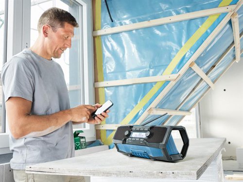 The Bosch GPB 18V-2 C Professional Bluetooth Radio with DAB+, Bluetooth®, FM, and AUX can be powered via 18V batteries (Not supplied) or AC mains. It provides intuitive operation, quick setup, USB charging and IP 54 protection.This unit is ideal for providing jobsites with radio entertainment as well as smartphone-sourced music. It can be placed vertically as well as horizontally and has both a handle and a hook for easy transportation and storage, further favoured by the radio’s compactness. The possibility of coupling two radios with one smartphone facilitates unique stereo sound.Comes as a Bare Unit, NO Battery or Charger supplied.Specification:Input Power: Battery: 18V Li-ion, DC: 230/240V.Radio Frequency: FM Range 87.5-108 MHz, DAB+ Range 174.928-239.2 MHz.Station Presets: 8.Rated power of amplifier (in mains operation): 15W.Weight: 2.5kg (without battery).