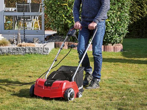 The Einhell GC-SA 1231/1 Electric Lawn Scarifier/Aerator is a powerful and reliable combined device designed to provide healthy lawn care. Recommended for lawns up to 300m². It has a ball bearing mounted cutting roller with 8 high-quality double blades to remove weeds and moss with their roots thoroughly. There is also a ball bearing mounted aerator roller with 42 claws to provide professional soil aeration.Working depth can be set in 3 stages meaning the scarifier/aerator can be adjusted to the requirements of soil and vegetation. A stand-by position protects the blades from damage. Its robust housing is made from high-quality, shock-resistant plastics. The folding guide rail enables the scarifier to be stored and transported easily.Supplied with a large 28 litre collector bag.Specification:Input Power: 1,200W.Working Width: 31cm.Working Depth: 3 Settings, Max. Depth 9mm.Number of Knives: 8, Number of Claws: 42.Collection Bag: 28 litre.Wheel Diameter: Front 18cm, Rear 10mm.Weight: 9kg.
