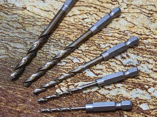 Faithfull Cobalt Quick-Change Impact Drill Bits feature a revolutionary tip design that is far superior to any other drill bit in the industry. These innovative drill bits have 7 cutting edges and 3 peaks that offer several distinct competitive advantages:- Super-accurate self-centring - you can make a hole in a round-pipe with one hand.- Speed - twice as fast as split point drill bits.- Tool lifetime - up to 10 times longer life in mild steel.Manufactured from M35 HSSE grade steel with a 5% cobalt content for increased heat resistance. The cutting performance is fantastic, both on precision and degree of finish, leaving much less defects (burr) than other drill bits. Its protruding centre tip acts like a pilot drill, enabling super-accurate positioning and stops the drill from wandering.These bits are impact rated and have a 1/4in quick-change shank for use in impact drivers. Produced in accordance to DIN 338 and DIN 3126-E6.3, for high precision tolerances and geometric accuracy.Ideal for heavy-duty industrial work in alloy steels, carbon steels, cast iron, hardened alloy steels, stainless steels, high-temperature alloys, titanium alloy, high strength steel and carbon fibre composite materials.The Faithfull 5 Piece HSSE M35 Cobalt Quick-Change Impact Drill Bit Set contains the following sizes: 2, 3, 4, 5 and 6mm.
