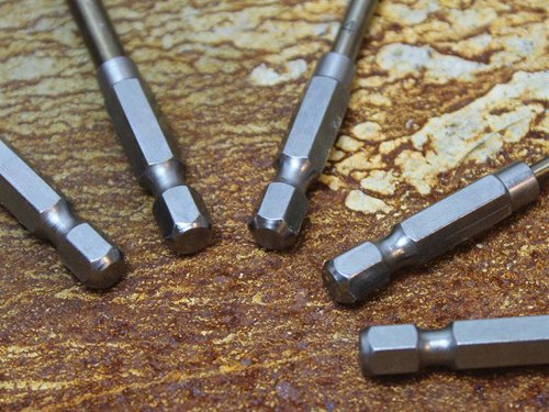 Faithfull Cobalt Quick-Change Impact Drill Bits feature a revolutionary tip design that is far superior to any other drill bit in the industry. These innovative drill bits have 7 cutting edges and 3 peaks that offer several distinct competitive advantages:- Super-accurate self-centring - you can make a hole in a round-pipe with one hand.- Speed - twice as fast as split point drill bits.- Tool lifetime - up to 10 times longer life in mild steel.Manufactured from M35 HSSE grade steel with a 5% cobalt content for increased heat resistance. The cutting performance is fantastic, both on precision and degree of finish, leaving much less defects (burr) than other drill bits. Its protruding centre tip acts like a pilot drill, enabling super-accurate positioning and stops the drill from wandering.These bits are impact rated and have a 1/4in quick-change shank for use in impact drivers. Produced in accordance to DIN 338 and DIN 3126-E6.3, for high precision tolerances and geometric accuracy.Ideal for heavy-duty industrial work in alloy steels, carbon steels, cast iron, hardened alloy steels, stainless steels, high-temperature alloys, titanium alloy, high strength steel and carbon fibre composite materials.The Faithfull 5 Piece HSSE M35 Cobalt Quick-Change Impact Drill Bit Set contains the following sizes: 2, 3, 4, 5 and 6mm.