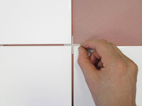 The Faithfull Long Leg Tile Spacers are ideal for most tiling applications. These versatile spacers can be easily snapped when ‘T’ joints are required and may be easily removed once the adhesive is set.How to use:Apply adhesive with a notched edge spreader and secure tile firmly. Position one spacer at each corner of the tile, add more spacers as each new tile is placed alongside. For evenly spaced wall and floor tiles, always use same spacer brand and product code during tiling process. Tiles must be left to set for 24 hours before grouting. Faithfull recommend removing spacers once tile adhesive has set.Please note: Size of spacer may vary slightly to dimension stated. Always use same spacer brand and product code during tiling process as each brand and product is different.Size: 2mm.Pack: Tub of 1,000.