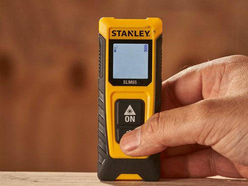 The STANLEY® SLM65 Laser Distance Measure is suitable for a wide range of professional measuring applications. Easy-to-use, thanks to its two-button operation: one to activate the device and take measurements, and a cog button to select different functions. Equipped with a generously-sized screen that displays two rows of measurements. Black characters on a white background make it easy to read measurements, even in bright conditions. The two-point system facilitates measurements from either the top or base of the unit, providing accuracy and flexibility in a multitude of measuring scenarios. Robust, reliable and durable, it has been subjected to a 1M impact drop test to ensure it withstands knocks and bumps, so every professional feels confident using it around the work site. A power saving mode will protect battery life by automatically turning off the laser after 120 seconds and the screen after 180 seconds.Specification:Functions: distance, continuous measurement, area, volumeAccuracy: ± 3mmOperating Range: 20mProtection Rating: IP40Power: 2 x AAA batteries (supplied)