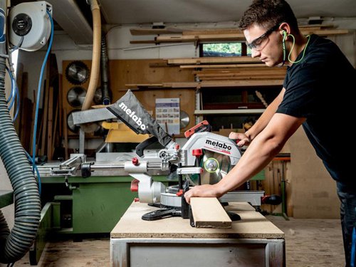 The Metabo KGS 18 LTX BL 216 Brushless Mitre Saw comes with a powerful brushless motor for sawing like a mains-powered tool. Soft start and overload protection provide a long motor and drive service life. It has a large cutting capacity thanks to the sliding function for wide work pieces.The turntable features stop points of common angles for fast, precise setting. With saw blade inclination from -2 to 47??, making it suited to undercuts. A quick-action clamp for secure fixing of the work piece from the top or front. There is also a depth guide for easy creation of grooves. Precision Cut Line (PCL) provides a precise shadow cutting line, without re-adjustment, thanks to a cleverly positioned LED. All scales and operating elements are visible from the working position and can be operated intuitively. Fitted with ergonomic handle areas for easy carrying, with one or two hands.Part of the CAS system. This product can be combined with all 18V battery packs and chargers of the CAS brands. Many brands, one battery pack system.Supplied with: 1 x Classic Cordless Cut Wood Saw Blade 254 x 30mm x Z48, 2 x Table Length Extensions, 1 x Length Guide, 1 x Material Clamp, 1 x Tool for Saw Blade Change, 1 x Chip Collection Bag, 1 x 18V 4.0Ah Li-Power Battery Pack and 1 x AIR COOLED Charger ASC 55.Specifications:No Load Speed: 4,000/min.Max. Cutting Speed: 53 m/s.Saw Blade: 254 x 30mm.Max. Cutting Width 90??/45??: 305/215mm.Max. Cutting Depth 90??/45??: 92/47mm.Cutting Capacity (mm): 90??/90?? 305 x 92, 45??/45?? 215 x 47.Turntable Setting Left/Right: 50??/50??.Saw Blade Tilt Left/Right: 47??/2??.Support Surface: 345 x 760mm.Weight: 14.8kg (without battery pack).