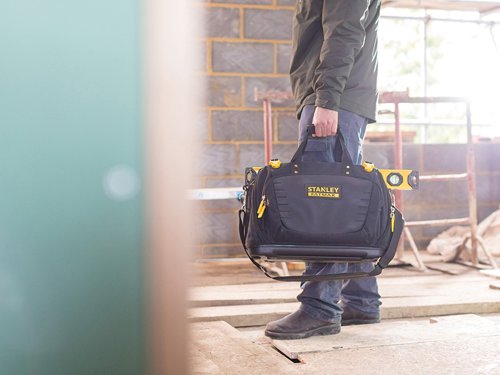 The Stanley FatMax?½ Quick Access Premium Tool Bag combines the advantages of both closed and open soft storage solutions into one. It has been constructed from durable materials for internal protection against tool damage. The high quality tarpaulin and 600 denier fabric provide added durability for increased wear resistance.3 large tool compartments and multiple pockets provide a quick and convenient storage solution depending on your needs. The reinforced waterproof base protects against dirt and moisture. The ergonomic padded shoulder strap allows for easier carrying of heavier loads.FEATURES:- Open mouthed workstation with 3 internal compartments and 1 external pocket- Combines strong flexible high quality Tarpaulin with 600D- Large rigid open compartment for quick tool access - Two large separate zippered wide compartments- Padded shoulder straps for heavy load carriage- Rigid water-proof plastic bottom- Personal belongings compartment for wallet, keys, mobile phone- Multiple pockets and tool holders for a wide variety of toolsSpecification:Dimensions: 470 x 230 x 350mm