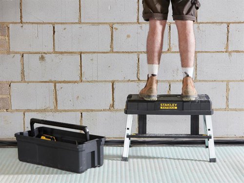 The Stanley Tools FatMax?½ Work Step Toolbox combines a toolbox and work step in one. It has a lightweight design with an ergonomic carry handle for easy carrying. The work step has stainless aluminium legs with non-slip feet to ensure optimum stability and longevity. For added safety the step has been fitted with safety lock buttons.Specification:External Dimensions: 640 x 296 x 287mmInner Dimensions: 560 x 265 x 200mmMax. Load: 30kgMax. Standing Load: 150kgWeight: 6.2kg