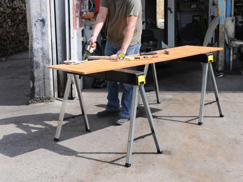 The Stanley Folding Sawhorses are easy-to-carry and store, they have strong robust aluminium legs that fold into the top for easy transportation. With a plastic top and non-slip rubber feet for added security and stability. Side latches are used to fasten two saw horses together for a wider work surface for door trimming, decking laying etc.Supplied as a Twin Pack.Specification:Max. Load: 340kg per pairWidth: 97cm (37in)