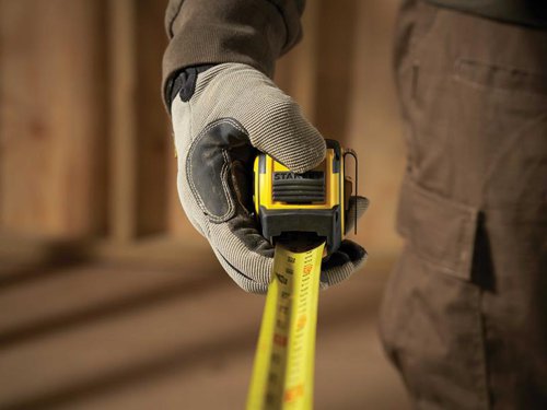 The Stanley FatMax® Next Generation Tape is built to withstand the most extreme jobsite environments. Equipped with patented Twin-Core™ technology for a compact case design that takes up less space on your tool belt.Measurements have been printed on both sides of the blade making it easier to read, especially in overhead measurements or in awkward spaces. With an abrasion-resistant blade coating, the first 20cm is treated with a BladeArmor® for enhanced protection against kinking or tearing in the most vulnerable part of the blade. It offers a greater reach, up to 4.9m of stand-out, so you can measure confidently from a distance, even when working alone.Ergonomically engineered to fit comfortably in the palm of your hand. A bi-material casing provides exceptional grip. The flat base ensures more stability on work surfaces. Fitted with an easy-to-use lock mechanism that engages and disengages with ease and holds strong when locked.A lanyard tether reduces the risk of dropping when working at heights. It's also fitted with a screw-free belt clip.Accuracy: EC Class II1 x STANLEY FatMax® Next Generation Tape 5m/16ft (Width 32mm).