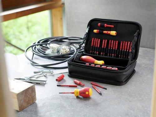 The 32 Piece Wiha slimVario® electric Tool Set, covers all standard screw profiles and is thus flexible in its use. All the VDE tools in this kit have been individually tested at 10,000 V AC for electrical safety in accordance with IEC 60900:2012. Approved for 1,000 V AC.Thanks to Wiha slimTechnology, the slimBit blades in the kit are up to 33% slimmer and can thus also easily reach low-lying screw and spring elements. When these slim blades are used with the extra-short Stubby handle, screws can be effortlessly reached even in confined spaces. The 6mm slimBits and nut driver inserts can only be used with speedE®, slimVario® or TorqueVario®-S electric tools.Supplied in a robust multifunctional bag. When unfolded, it functions as a work bench stand for easy retrieval of the tools. There is also a strap for hanging the bag on the wall.Contains the following:1 x SoftFinish® electric slimVario Stubby Bit Holder Screwdriver.1 x PicoFinish® electric slimVario Fine Screwdriver.1 x SoftFinish® electric slimVario Bit Holder Screwdriver.1 x electric slimVario Extension for slimBits.1 x electric slimVario Adapter for 1/4in Nut Drivers.4 x 75mm slimBit electric Slotted Bits: 2.0, 3.5, 5.5 & 6.5mm.3 x 75mm slimBit electric Phillips Bits: PH0, PH1 & PH2.2 x 75mm slimBit electric Pozidriv Bits: PZ1 & PZ2.4 x 75mm slimBit electric TORX® Bits: T10, T15, T20 & T25.2 x 75mm slimBit electric PlusMinus/Pozidriv Bits: SL/PZ1 & SL/PZ2.3 x 75mm slimBit electric Hex Bits: 3.0, 4.0 & 5.0mm.8 x 1/4in Insulated Hex Nut Drivers: 5.0, 5.5, 6.0, 7.0, 8.0, 10, 11 & 13mm.