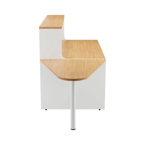 With clean and elegant lines, this Jemini Reception Unit is ideal for use in a variety of reception areas. The modular design features a built-in modesty board as standard, as well as a sturdy 25mm thick desktop. The extension unit allows extra desk space or to allow access for wheelchair users. This reception unit features a white base with a top finished in Nova Oak.