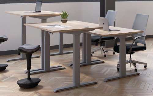 This Jemini Sit/Stand Desk features 3 stage height adjustability with a digital display and 4 pre-set buttons for an easy transition between sitting and standing. The 25mm thick desktop is mounted on sturdy cantilever legs and features dual cable management ports. This desk measures 1200x800x630-1290mm and comes with silver legs.