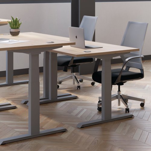 This Jemini Sit/Stand Desk features 3 stage height adjustability with a digital display and 4 pre-set buttons for an easy transition between sitting and standing. The 25mm thick desktop is mounted on sturdy cantilever legs and features dual cable management ports. This desk measures 1400x800x630-1290mm and comes with white legs.