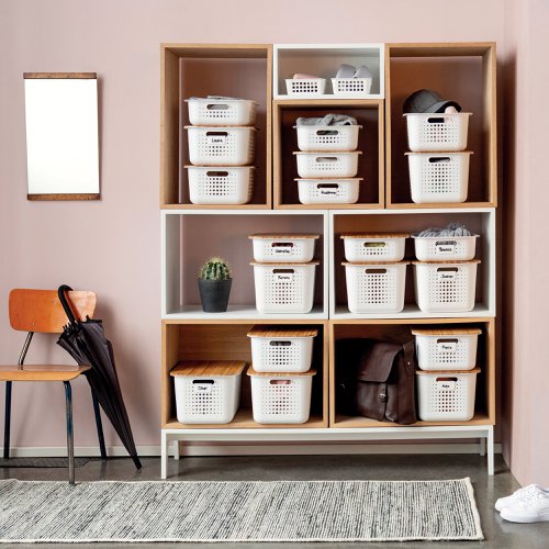 SmartStore Basket Recycled 20 in white is made from recycled plastic that is lightweight, durable and suited for both dry and wet surfaces. The basket fits perfectly in any room to store with a Scandinavian touch, and the large size has room for bigger office items.