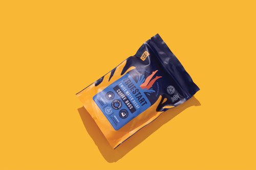 TST10138 | These TrueStart Decaffeinated coffee bags contain a full-bodied filter coffee designed for quick, no-mess brewing. Essentially "tea bags for coffee," they offer a fresh cup in 2–3 minutes by simply adding hot water, stirring, and squeezing. The chemical-free decaffeination process, using Swiss water on 100 percent Brazilian Arabica beans maintains the bold, punchy flavour. Supplied in a recyclable, resealable pouch of 25 coffee bags.