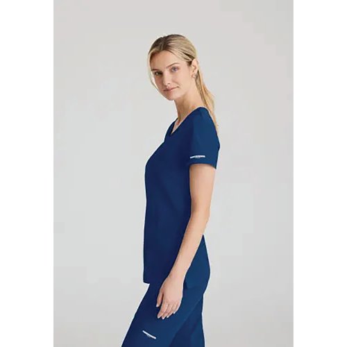 WIS12747 | The SK102 Female Reliance V neck scrub top is a modern design great for stylish healthcare staff. With 7 recycled bottles in every top.