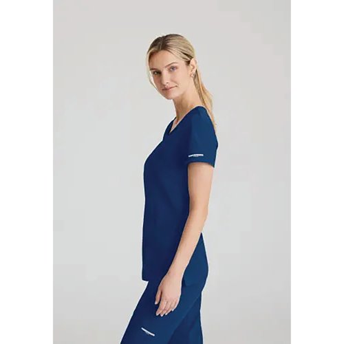 WIS12749 | The SK102 Female Reliance V neck scrub top is a modern design great for stylish healthcare staff. With 7 recycled bottles in every top.