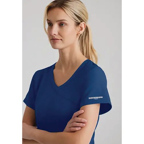 WIS12771 | The SK102 Female Reliance V neck scrub top is a modern design great for stylish healthcare staff. With 7 recycled bottles in every top.