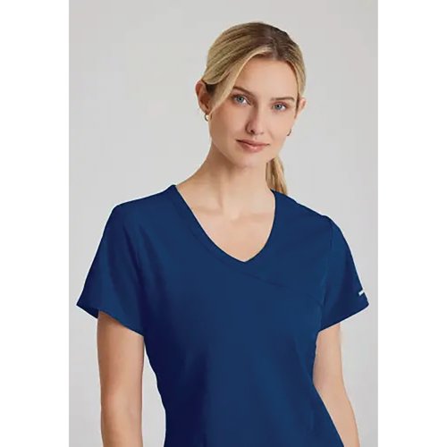 WIS12771 | The SK102 Female Reliance V neck scrub top is a modern design great for stylish healthcare staff. With 7 recycled bottles in every top.