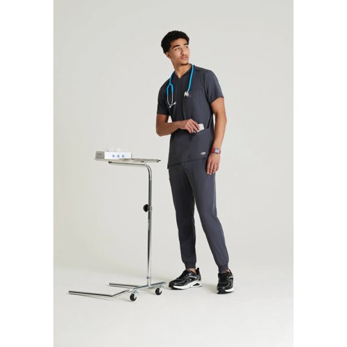 WIS18111 | The SKT193 Thesis Scrub top from Skechers by Barco provides unparalleled comfort in eco-friendly fabrics, designed with an active lifestyle in mind, the round neck gives a unique look for your scrubs. Made with 40% recycled Polyester, the Skechers scrubs are good for the planet and good for you.