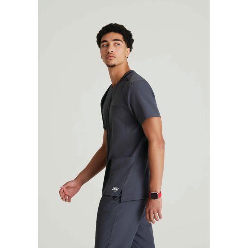 WIS18130 | The SKT193 Thesis Scrub top from Skechers by Barco provides unparalleled comfort in eco-friendly fabrics, designed with an active lifestyle in mind, the round neck gives a unique look for your scrubs. Made with 40% recycled Polyester, the Skechers scrubs are good for the planet and good for you.