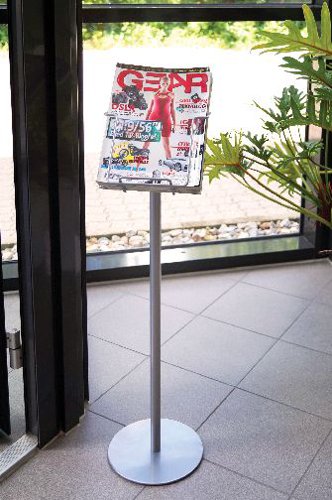 This Twinco Newspaper Stand features a wire holder that can display stacks of newspapers, magazines or brochures. Its simple self-standing design makes it ideal for placing in entranceways or by reception desks.