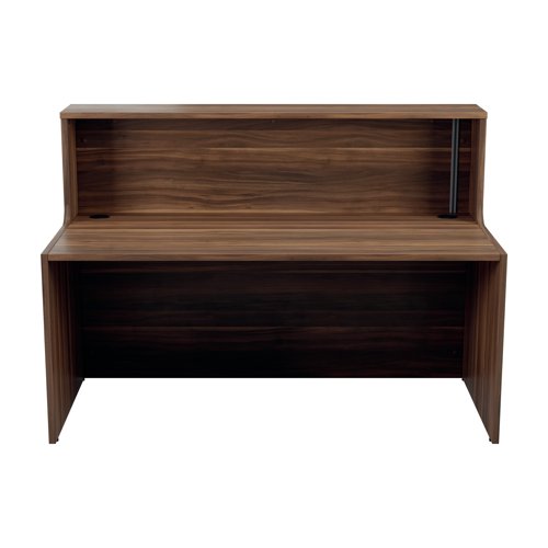 With clean and elegant lines, this Jemini Reception Unit is ideal for use in a variety of reception areas. The modular design features a panel end construction incorporating a fixed riser unit. The unit has a sturdy 25mm thick desktop. This reception unit measures 1600x800x740mm and is finished in Dark Walnut.