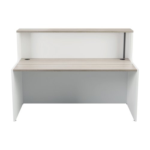 With clean and elegant lines, this Jemini Reception Unit is ideal for use in a variety of reception areas. The modular design features a built-in modesty board as standard, as well as a sturdy 25mm thick desktop. This reception unit measures 1400x800x740mm and has a white base with a top finished in Grey Oak.