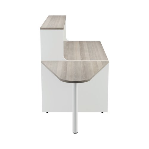 With clean and elegant lines, this Jemini Reception Unit is ideal for use in a variety of reception areas. The modular design features a built-in modesty board as standard, as well as a sturdy 25mm thick desktop. The extension unit allows extra desk space or to allow access for wheelchair users. This reception unit comes with an extension and has a white base with a top finished in Grey Oak.