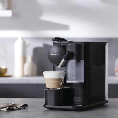 The Nespresso single serve, coffee machine features three beverage buttons to easily select your favourite drink, whether that be an Espresso or one of the coffee recipes using the removable milk jug. Simple to use with the 'One touch' system, this compact coffee machine is easy to clean with a dishwasher safe, removable water tank and milk jug. Enjoy premium coffee in the comfort of your own home with the Lattissima Nespresso coffee machine. Supplied in white with an Energy A++ rating.