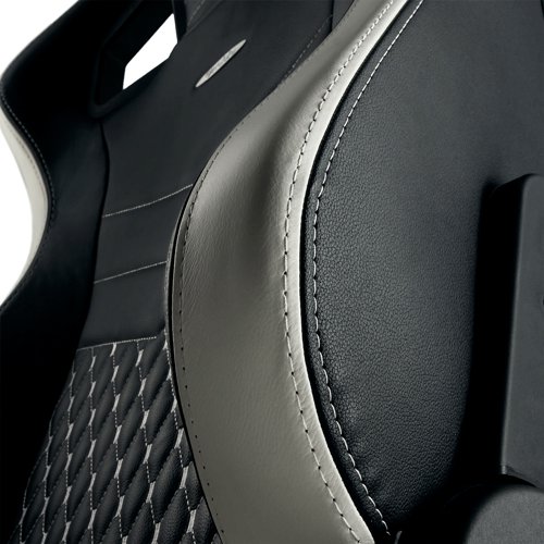 The noblechairs EPIC is a one of a kind luxury gaming chair. With a genuine leather cover, premium design, high-precision manufacturing plus ample features and adjustment options. There is also a premium cushion set included. An advanced rocking mechanism, that allows for rocking the chairs up to 14 degrees, is accompanied by softly cushioned 4D armrests made of polyurethane, 360-degree swivel rotation, flexibly adjustable seat height via a safety class 4 gas lift and a sturdy steel frame mounted on a durable five-star-base made of pure aluminium.