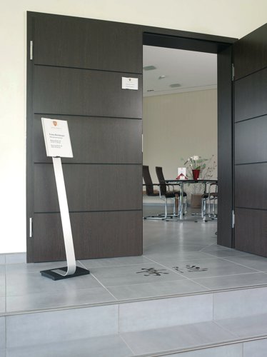 The Durable Information Sign Floor Stand is the simple way to present information in a wide range of application areas and can be used as a wayfinding system due to its double-sided readability. The aluminium stand is extremely stable thanks to the high-quality weighted base and rubber pads. The anti glare panel can easily be rotated from portrait to landscape and is height adjustable. The viewing angle of the panel is also adjustable by 10 degrees.
