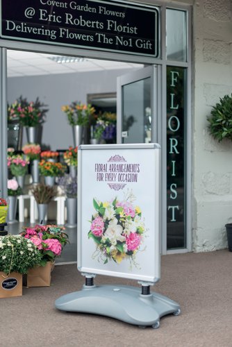 The Deflecto A1 Pavement Display Board creates signage that stands out to the public. Suitable for both indoor and outdoor use. Easily change the signage with the snap frame, no tools required. The curved base has wheels and incorporates a handle to make moving the stand simple and easy.