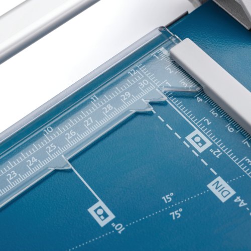 This Dahle Personal Rolling Trimmer features a self-sharpening blade that cuts in both directions and an automatic clamping system, which keeps pages secure when cutting. The sturdy metal base features printed guidelines for easy, accurate use. This A4 trimmer has a cutting length of 317mm and a capacity of up to 7 sheets.