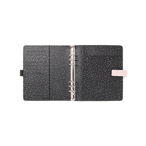 Enjoy everyday planning with this A5 organiser from the Filofax Confetti Collection, with a Rose, smooth faux-look cover with gold foil accents and charcoal quartz colour patterned interior. With a 30mm ring capacity, and a closure strap to ensure contents are protected and remain private. Supplied with a transparent flyleaf, front sheet, week to view diary with appointment times, six tab index, four sheets of to do lists, eight sheets of white ruled notepaper, four sheets of white quadrille notepaper, eight sheets of white plain notepaper, eight sheets of contacts, eight sheets of blue ruled notepaper, eight sheets of green ruled notepaper, eight sheets of pink ruled notepaper, ruler/ page marker, top opening envelope.