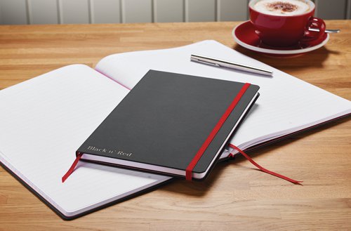 This premium Black n' Red A6 notebook contains 144 pages of quality Optik paper, which is ruled and numbered for neat, indexed notes. The casebound notebook features durable hard covers with a soft touch finish, as well as a red elasticated strap to help keep contents secure. The notebook also features an inside rear pocket for storage of additional loose pages and a ribbon marker for quick and easy reference. This pack contains 1 x A6 notebook.