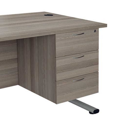 Finished in Grey Oak, the Jemini fixed pedestal features 3 drawers which will take A4 files. Measuring W400 x D500 x H495mm with a 25mm desktop, this Jemini fixed pedestal is designed for use with single upright desks, making an ideal storage solution.