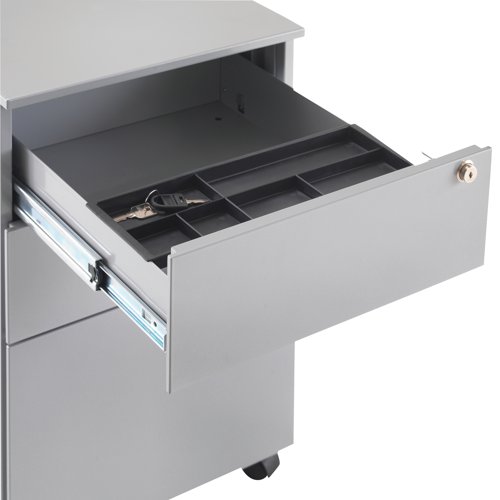 This entry level First mobile steel pedestal features 2 stationery drawers and 1 filing drawer suitable for use with A4 suspension files. The tough steel carcass features an anti-tilt mechanism, allowing only 1 drawer open at a time. This pedestal measures W380 x D470 x H615mm and comes in a silver finish with an integrated handle design.