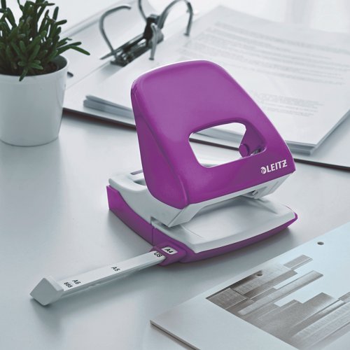 Leitz NeXXt metal punch in striking WOW colours that let your personality shine through. 2 hole punch for everyday use. Robust and reliable with a punching capacity of 30 sheets of 80gsm paper. Patented easy slide-in grip zone and ultra sharp stamps reduce punching effort. Purple. Buy any 3 WOW products and claim a free Leitz Cosy Footrest.
